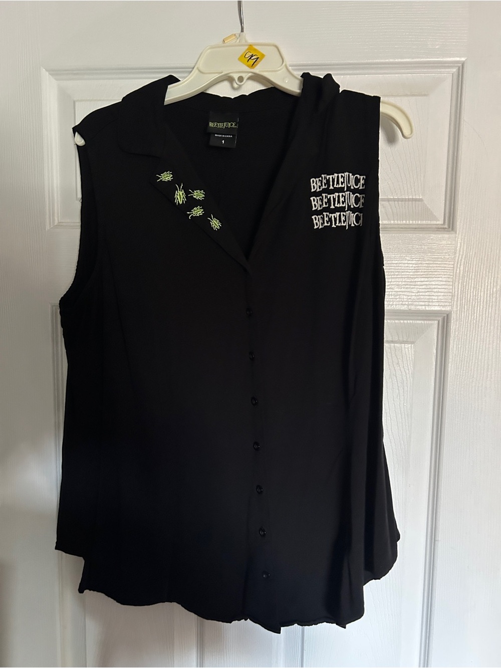 Warner Bros. Black Beetlejuice Sleeveless Button-Down Top